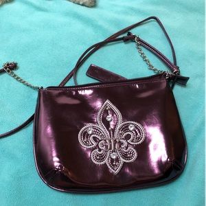 Miss me purple shiny purse.